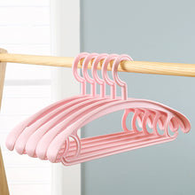 Load image into Gallery viewer, 厂家宽肩加厚衣架成人挂衣架无痕多功能魔术衣架晾衣架 塑料衣架
