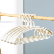 Load image into Gallery viewer, 厂家宽肩加厚衣架成人挂衣架无痕多功能魔术衣架晾衣架 塑料衣架
